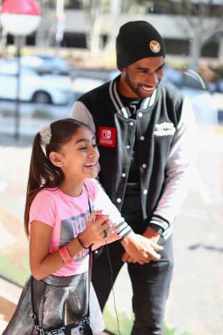 In this photo provided by Nintendo of America, a fan plays the Pokémon: Let’s Go, Pikachu! and Pokémon: Let’s Go, Eevee! games on the Nintendo Switch system in Santa Monica, California. This event kicked off a nationwide tour celebrating the games leading up to their launch in November. Pokémon: Let’s Go, Pikachu! and Pokémon: Let’s Go, Eevee! launch in Nintendo eShop on Nintendo Switch and at retailers on Nov. 16. The immersive Poké Ball Plus controller that can be used to play the games also hit stores the same day. (Photo: Business Wire)