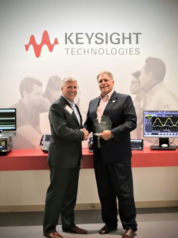 John Janowaik, executive director of ECEDHA; Greg Peters, vice president of business development for the Communications Solutions Group, Keysight Technologies, Inc. (Photo: Business Wire)
