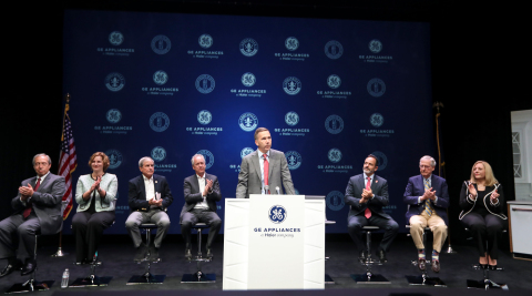 Kevin Nolan, CEO of GE Appliances, a Haier company, announces $200 Million investment and 400 new jobs on October 1st in front of (pictured left to right) Peter Pepe, VP Clothes Care at GE Appliances, Melanie Cook, COO at GE Appliances, Representative John Yarmuth, Mayor Greg Fisher, Governor Matt Bevin, Senator Mitch McConnell and Cynthia Fanning, VP of Dishwasher at GE Appliances. (Photo: Business Wire)

