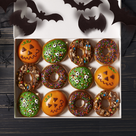 Krispy Kreme Doughnuts announced the launch of their Halloween doughnut collection, which features the new candy-covered Trick-or-Treat Doughnut, the new Monster Batter Doughnut, the Jack-o-Lantern Doughnut and the Chocolate Iced with Halloween Sprinkles Doughnut. All are available today through Oct. 31 at participating U.S. Krispy Kreme shops. (Photo: Business Wire)