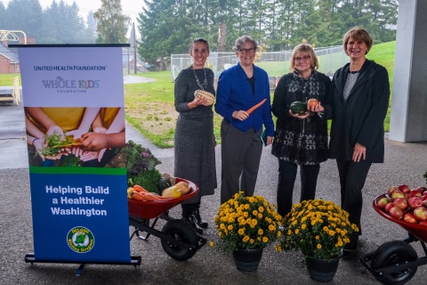 The United Health Foundation and Whole Kids Foundation announced 24 grants, totaling $48,000, to Washington schools to develop or expand existing vegetable gardens and beehives, and provide educational resources about agriculture, caring for the environment and maintaining healthy lifestyles. L to R: Nona Evans, president and executive director of Whole Kids Foundation; Washington State Rep. Laurie Jinkins; Washington First Lady Trudi Inslee; Claire Verity, CEO, UnitedHealthcare Employer & Individual, Pacific Northwest (Photo: Suzi Pratt).