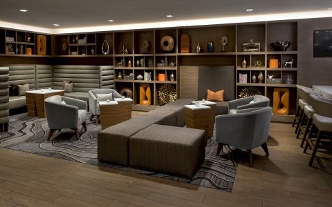 Melville Marriott's Greatroom includes banquette seating, a bistro, library, bar and private room for guests' meeting and socializing needs. (Photo: Business Wire)