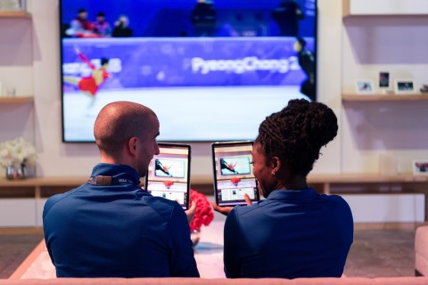 (Left to right) Benoit Huot (Canada, Para swimming) and Seun Adigun (Nigeria, Bobsleigh) demo 'couch commerce' where Olympic fans will be able to make purchases in real-time through an in-home omni-channel shopping experience. (Photo: Business Wire)