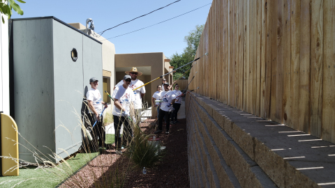 Hunt employees from Cottonwood Springs work on painting touch ups at the Rescue Mission of El Paso i ... 