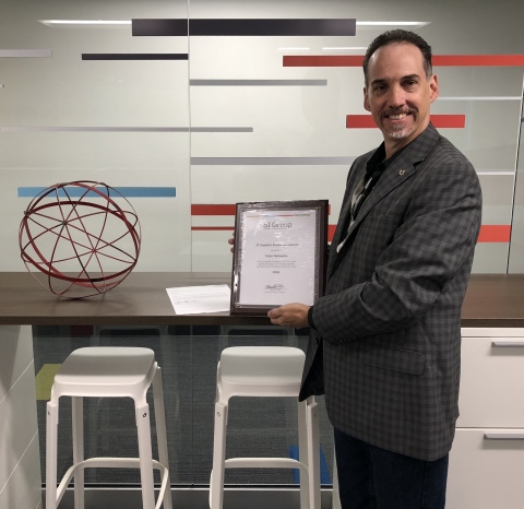 Allen Look, CIO at SI Group Displaying Talari's 2018 “Supplier of the Year Award” (Photo: Business Wire)