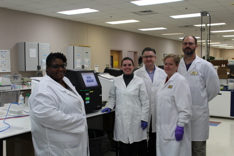 Standing inside Burlington's LabCorp facility are (from left): ACC Biotechnology students Tanya Mosl ... 