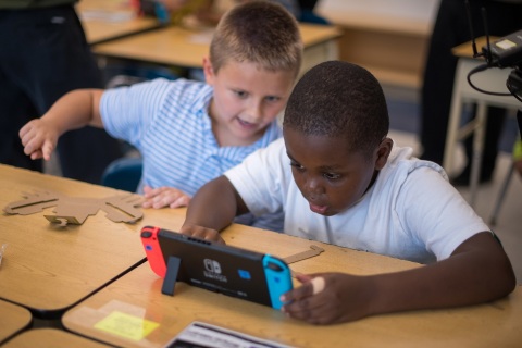 In this photo provided by Nintendo of America, third-grade students at the Lake Hiawatha Elementary School in Lake Hiawatha, New Jersey, participate in an interactive learning session with the Nintendo Labo: Variety Kit for the Nintendo Switch system. On Oct. 23, Nintendo and the Institute of Play announced a partnership to bring Nintendo Labo kits into elementary classrooms nationwide. The program combines the innovative play of Nintendo Labo with the basic principles of science, technology, engineering, art and mathematics (STEAM) to inspire kids and help make learning fun.