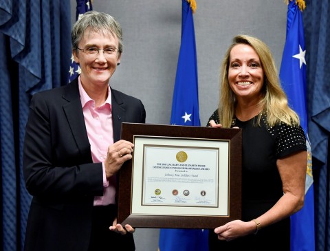 Secretary of the United States Air Force, Heather Wilson (left), presents Johnny Mac Soldiers Fund p ... 