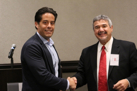 Blake Gurfein, PhD and Tivic Health's VP of Research & Scientific Affairs receiving Gold Electrode A ... 
