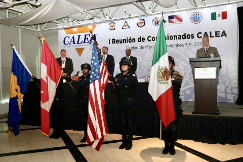 Members of the Mexican Federal Police Honor Guard present flags of the four countries (United States ... 