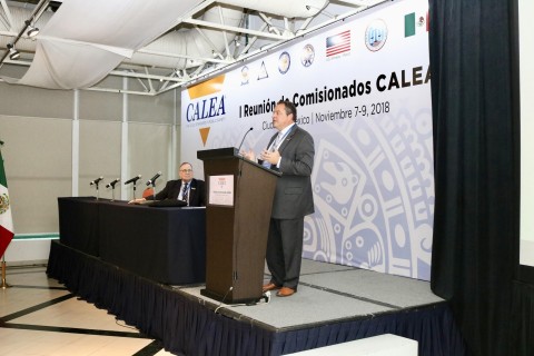 Jim Burch, Executive Vice President of the Police Foundation, and Virgil Young, International Program Manager at the Police Foundation, give a presentation during the conference on how the Foundation is helping Mexican law enforcement agencies achieve CALEA accreditation. (Photo: Erica Richardson/Police Foundation)