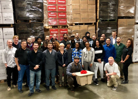 The Vericool team prepares to fill their new consumer coolers - Ohana Cooler™  - with Christmas dinners for Richmond families (Photo: Business Wire)