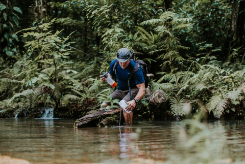 This traveler demonstrates the easy-to-use GRAYL GEOPRESS by collecting water from a river in Guatemala, providing 24 ounces of clean, safe drinking water in just eight seconds. (Photo: Kyle Murphy, @BriskVenture)