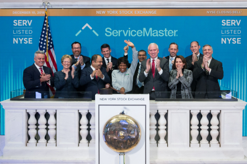 On Dec. 10, the ServiceMaster executive team, including CEO Nik Varty, joined Terminix service technician, Brenda Bell, to ring the bell of the NYSE. (Photo: Business Wire)