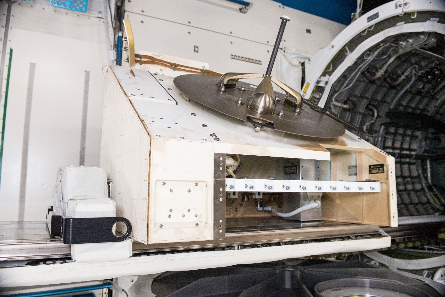 Orbital Sidekick’s ISS-HEIST hyperspectral payload (silver rectangular box, right) integrated into the NanoRacks External Platform and awaiting deployment on the International Space Station. Credit: NanoRacks/NASA