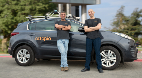 Ottopia’s co-founders, Leon Altarac (CTO) and Amit Rosenzweig (CEO) with the company’s R&D car. (Photo: Business Wire)