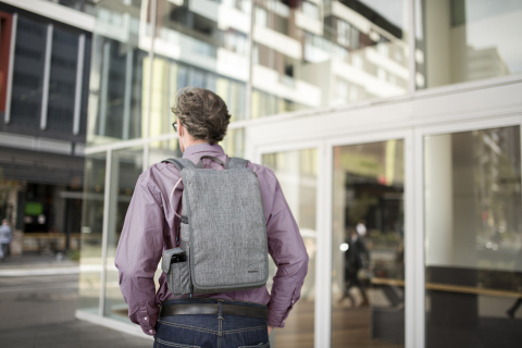 Man walking with ResMed Mobi portable oxygen concentrator (Photo: Business Wire)