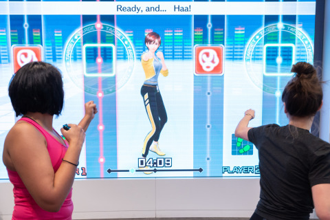 In this photo provided by Nintendo of America, Instagram fitness influencer Niki Klasnic plays the Fitness Boxing game with [Felia M. of Nintendo Power Couple] during a special event at the Nintendo NY store in New York on Jan. 15, 2019. Fitness Boxing is a new rhythm-based boxing game for the Nintendo Switch system that offers variety of training options to help people achieve their fitness goals. (Photo: Business Wire)