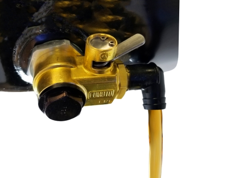 The SX Industrial valve makes changing oil a clean and effortless part of your engine maintenance routine. (Photo: Business Wire)