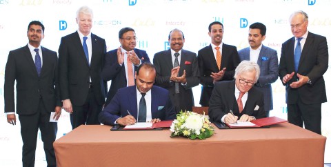 Adeeb Ahamed, Managing Director, Twenty14 Holdings signing the agreement with Necron AG CEO Gerard v ... 