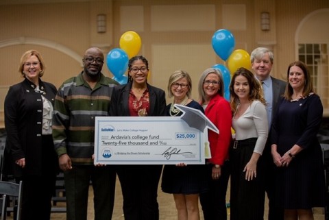 Bridging the Dream Scholarship recipient and St. Elizabeth High School senior Ardavia Lee is surrounded by family, Sallie Mae executives, and her school counselor, who nominated her for the scholarship. (Photo: Business Wire)