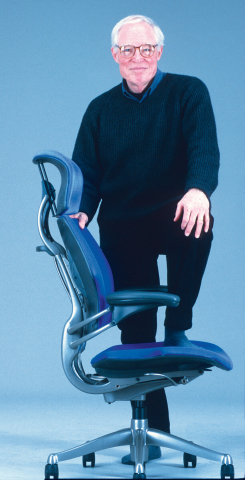 Designer Niels Diffrient with Freedom Headrest chair (Photo: Business Wire)