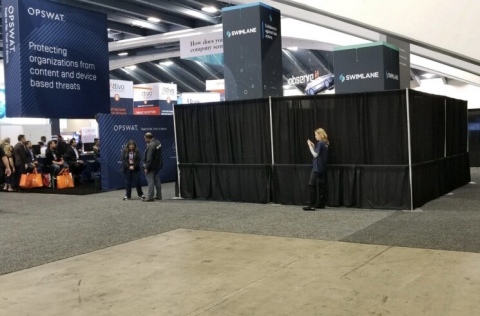 RSAC staff covers Swimlane booth. (Photo: Business Wire)