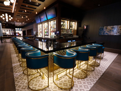 CUT by Cinemark features a full-service bar offering more than 20 popular beers, including local draft IPAs, as well as an impressive wine selection, four specialty martinis and signature cocktails. (Photo: Business Wire)