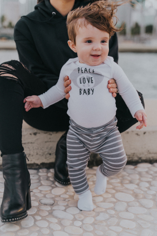 The Hanes Ultimate Baby line was developed using HanesBrands' Innovate to Elevate process, and offers 60 styles of babywear, in knits and fleece, including bodysuits, hoodies, crews, polos, joggers, socks and diaper covers. Photo courtesy of Daniela Ramirez (@Nany)