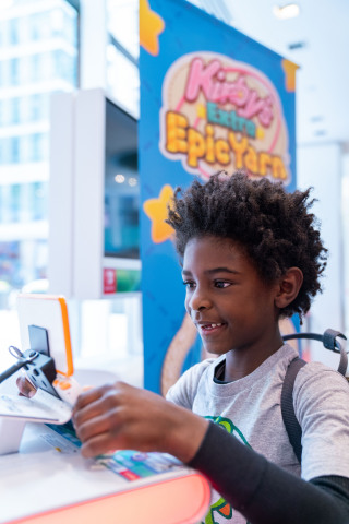 In this photo provided by Nintendo of America, Avery D., 7, of Bronx, NY gets adventurous during a special event at the Nintendo NY store in Rockefeller Plaza to celebrate the launch of Kirby’s Extra Epic Yarn, which brings Kirby’s craftiest adventure to life with extra epic new challenges and extra abilities. Kirby’s Extra Epic Yarn is now available for the Nintendo 3DS family of systems. (Photo: Business Wire)
