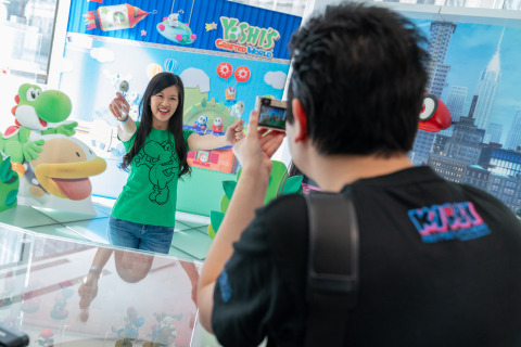 In this photo provided by Nintendo of America, Evelyn H. of Brooklyn, NY celebrates the launch of the Yoshi’s Crafted World and Kirby’s Extra Epic Yarn games during a special event at the Nintendo NY store in Rockefeller Plaza. Both games feature classic characters and an adorable hand-crafted look. The all-new Yoshi’s Crafted World will be available for Nintendo Switch on March 29 and Kirby’s Extra Epic Yarn is now available for the Nintendo 3DS family of systems. (Photo: Business Wire)