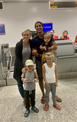 The Bucket List Family checking in at the LATAM Airlines counter for their flight to South America. (Photo: Business Wire)