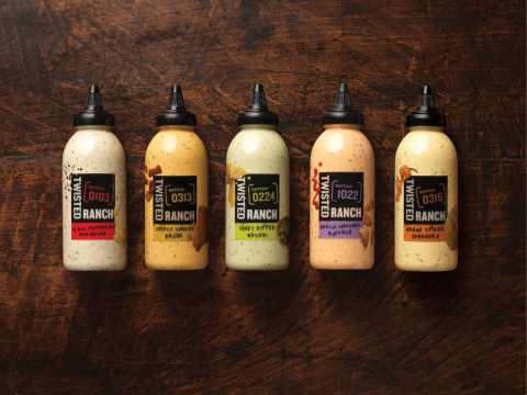 Twisted Ranch is available in five bold flavor varieties: Black Pepper Parmesan, Cheesy Smoked Bacon, Honey Dipped Wasabi, Garlic Smashed Buffalo and Mango Spiked Habanero. (Photo: Business Wire)