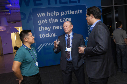 Brad Smith, D.D.S., dean in the College of Dental Medicine-Arizona at Midwestern in Glendale, Arizona (center) talks with Aspen Dental practice owner Dr. David Sung (left) and Dr. Arwinder Judge, chief clinical officer at Aspen Dental Management, Inc. (right) during an open house event at the new Aspen Dental Scheduling Center in Chandler, Arizona. Coming on the heels of the opening of a new learning and development center in Chicago earlier this year, the expansion is designed to better support Aspen Dental’s industry-leading new patient demand and continued growth across the U.S., which will include 80 new office locations in 2019 alone. (Photo: Business Wire)