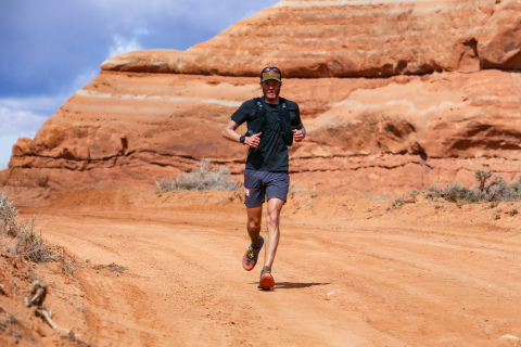 Jonathan Van Dyke running 50K ultramarathon, Behind the Rocks, in Moab, Utah. Photo courtesy of AKTIVA Sport Photography.