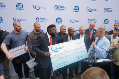 David Ortiz (Big Papi) and Granite CEO Rob Hale present the symbolic check for $6.5 million donation to Kevin Churchwell, MD – EVP of Health Affairs and COO of Boston Children’s Hospital during Granite’s 6th Annual “Saving by Shaving” event on April 3, 2019. Onlookers and supporters include New England Patriots Joe Thuney, Derek Rivers and Ted Karras, Boston Bruins legend Ray Bourque and Boston Red Sox President Sam Kennedy. (Photo: Business Wire)