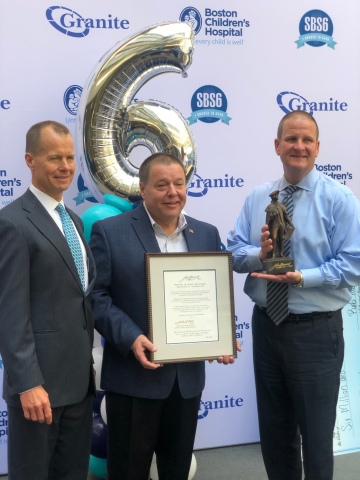 Thomas P. Koch, Mayor of the City of Quincy, Mass., (center) presents the Maquette of John Hancock to Granite COO Rand Currier (left) and Granite CEO Rob Hale (right) during Granite’s 6th Annual “Saving by Shaving” event on April 3, 2019. (Photo: Business Wire)