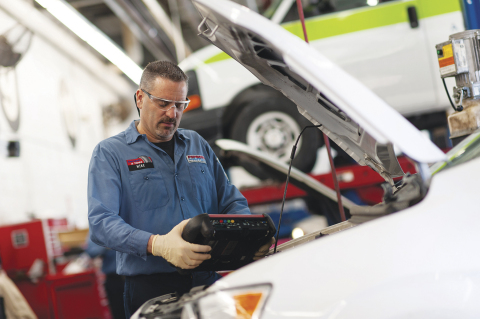 A Pep Boys Fleet technician completing a vehicle repair. (Photo: Business Wire)