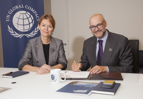 UN Global Compact CEO, Lise Kingo, and Tapestry, Inc. CEO, Victor Luis, at the UN Global Compact Headquarters in New York City. (Photo: Business Wire)