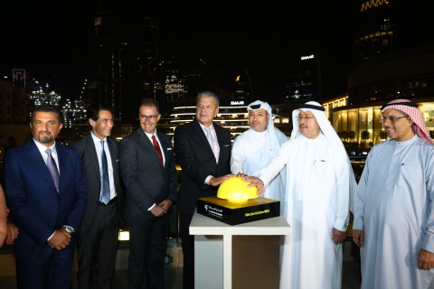 Western Union President and Global CEO Hikmet Ersek joins Osama Al Rahma, CEO, Al Fardan Exchange to trigger the Western Union light show on the iconic Burj Khalifa, launching Western Union digital services in the UAE. He is joined by Western Union and Al Fardan executives. (Photo: Business Wire) 