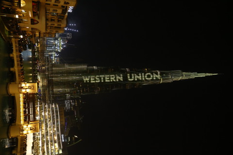 Iconic Burj Khalifa lights up with Western Union colors, a first for a financial services firm. (Photo: Business Wire) 