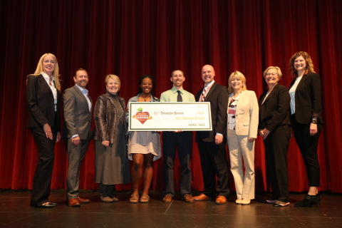 Teacher Christopher Donovan receives a check for the Barnes & Noble National Teacher of the Year Award with nominating student Brooklynne Mitchell-Arno and officials from Barnes & Noble and Ayer Shirley Regional School District. (Photo: Business Wire)