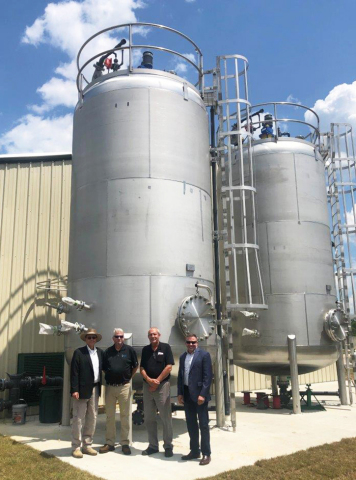 BCR Inc.'s Neutralizer(R) technology solution will create Class AA biosolids for Clay County Utility Authority, CCUA. Photo taken May 17, at the grand opening for Mid-Clay Wastewater Treatment facility. From left to right is Tom Morris, Executive Director Clay County Utility Authority (CCUA); Todd Chambers, Managing Director, Customer Service for BCR; Dennis Martin, Wastewater Superintendent Clay County Utility Authority and far right is Joshua Scott, CEO and President for BCR Inc. (Photo: Business Wire)