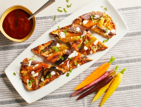 CPK's new BBQ Heirloom Carrot Flatbread is a veggie-forward spin on the iconic Original BBQ Chicken Pizza. (Photo: Business Wire)