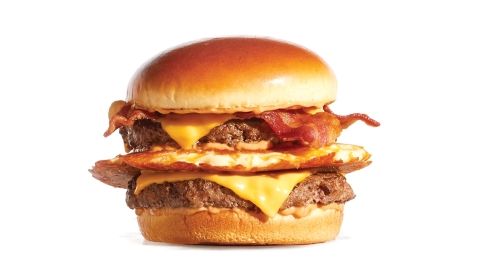 The new Big IHOP Pancake Burger includes a buttermilk pancake griddled with Cheddar cheese layered between two premium Steakburger patties, then topped with American cheese, custom-cured hickory-smoked bacon and house-made IHOP sauce. (Photo: Business Wire)