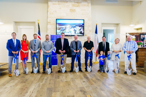 Two schools recently broke ground in Santa Rita Ranch, including the Divine Savior Academy. Shown at that ceremonial event are, from left, Carlos Leyrer, Dana Kirchoff, Stephen Apt, Barrett Schultz, Jason Hale, Bill Starke, Mark Hartman, Robert Timmerman, (with Hunter Timmerman, first DSA student), Elizabeth Horne and Ed Horne. (Photo: Business Wire)