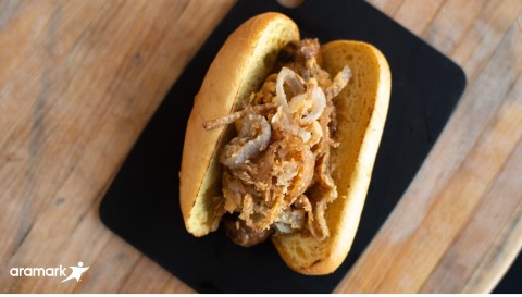 Vegan menu items at two of the ballparks Aramark serves, Citi Field and Kauffman Stadium, were recently recognized on PETA's 2019 most vegan-friendly ballparks list. Highlights include this 100% plant-based sausage served with sauerkraut, from Kauffman Stadium. (Photo: Business Wire)