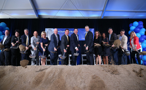 MassMutual Chairman, President and CEO Roger Crandall (eighth from left) is holding the original shovel used for the groundbreaking of MassMutual’s headquarters building in Springfield in 1925. (l-r) Sean Anderson, Head of Facilities at MassMutual; Susan Cicco, Head of Human Resources & Employee Experience at MassMutual; Richard Martini, Chief Operating Officer at The Fallon Company; Anis Baig, Head of Talent Acquisition & People Analytics at MassMutual; Jennifer Halloran, Head of Marketing and Brand at MassMutual; Joe Fallon, Founder, President and CEO of The Fallon Company; Boston Mayor Martin J. Walsh; Roger Crandall, Chairman, President & CEO of MassMutual; Massachusetts Governor Charlie Baker; Teresa Hassara, Head of Workplace Solutions at MassMutual; Pia Flanagan, Chief of Staff at MassMutual; Mike Fanning, Head of MassMutual U.S. (MMUS); Gareth Ross, Head of Enterprise Technology and Experience at MassMutual, and Renee Roeder, Head of MMUS Business Project Management Office at MassMutual break ground on MassMutual’s new Boston building at 10 Fan Pier Boulevard in Boston’s Seaport neighborhood. (Photo: Business Wire)