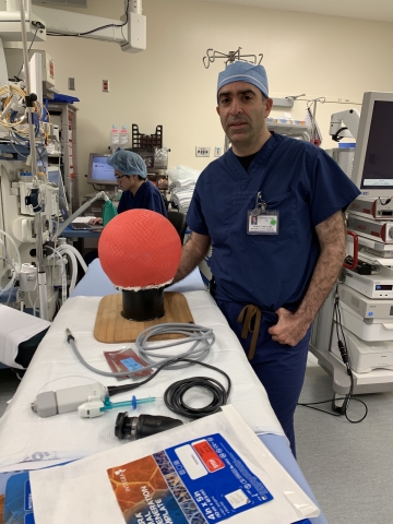CHLA Fetal Surgeon Ramen Chmait trains for percutaneous fetoscopic spina bifida surgeries using a red rubber ball. (Photo: Business Wire)