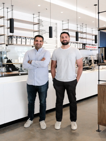 For Five Coffee founders Stefanos Vouvoudakis and Tom Tsiplakos stand inside the new 1 Liberty Plaza cafe a few days prior to opening. (Photo: Business Wire)